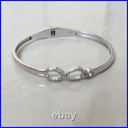 Round Cut Diamond Infinity Shape Bangle Bracelet In Solid 14K White Gold Plated